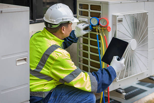 Professional Heat Pump Repair technician working in Whitehall, NY